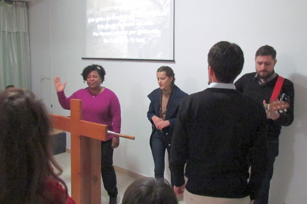 Norma, Evianda, and Rafael as the praise team