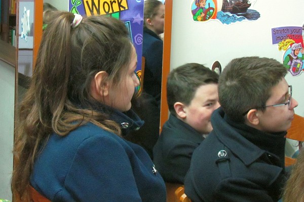 students listen to the presentations