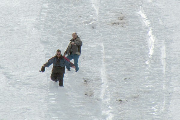 Dini and "Skander" come off of the mountain
