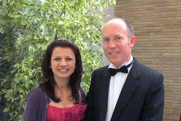 Mira and Robert Cook are dressed up for the evening