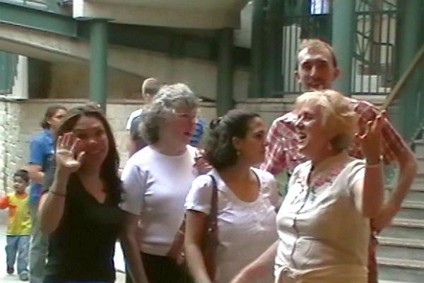 Janet wlking with some family members in San Antoniio