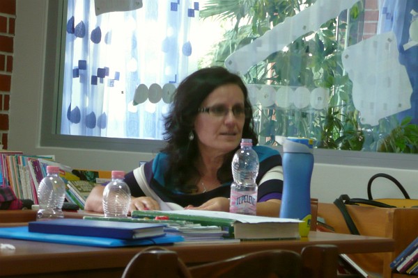 Klementina leading a faculty/staqfff meeting at LAC