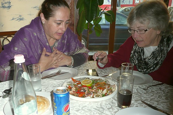 Bardha and Elsie eye the raw seafood salad