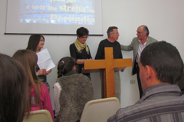 Dini introduces Phil and Betsy Moyer as speakers