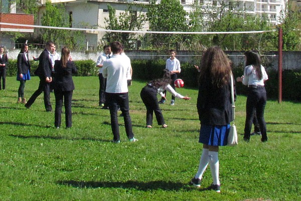 boys and girls both play volleyball
