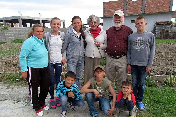 a group photo o0 Elsie and I and the village family
