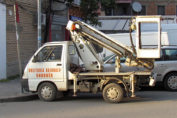 slamm "cherry picker" truck across from our apartment