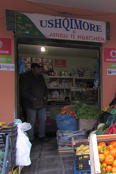 the person tending the shop and its insides