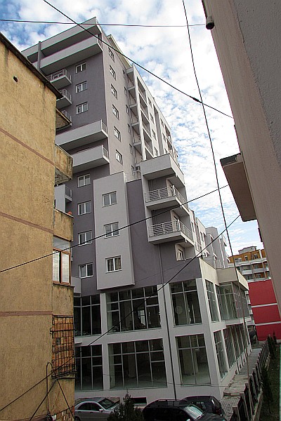 high-rise apartment behind us