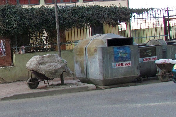 garbage bins along the street