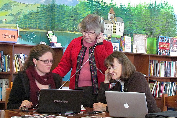 Elsie and Lois King listen to a video Lisa made