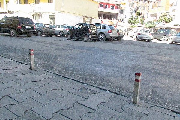 two posts along the street, one of such I ran into 