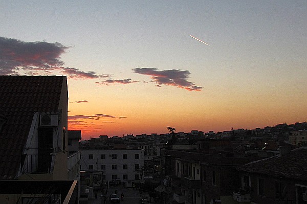 an orange-hued sunset from our balcony
