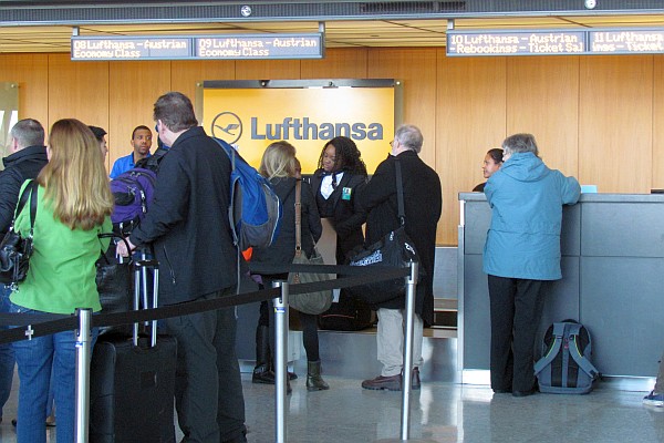 Elsie waiting to pay for our extra luggage