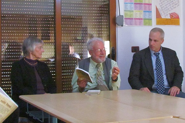 Grace and David Shenk and Monathan Borman speak with LAC staff and teachers