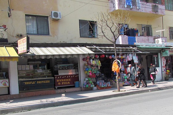 looking across the main streeet at the byrek shop and others