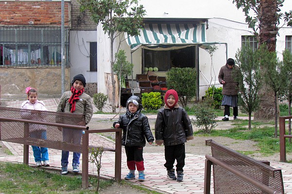 girls are also out in the little park playinng