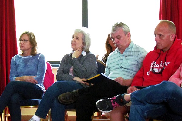 listening to a report from other mission workers