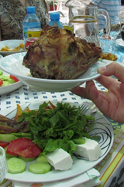 the head of the roasted kid for the old guest