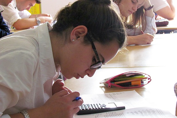 Kledja works intently on her exam