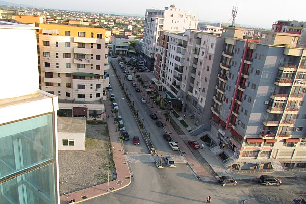 looking at a street layout from the top floor of an apartment building