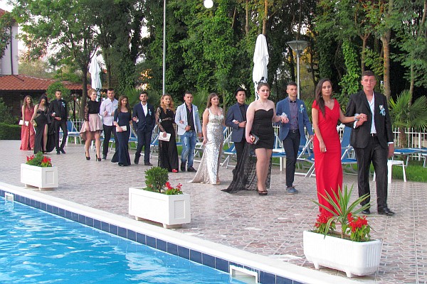 the seniors and their escorts arrive at the prom