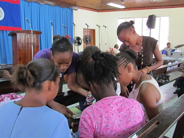 teenage girls gather chat in the Open Door Church