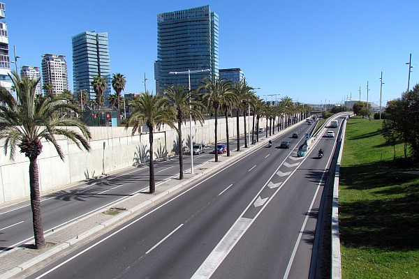 a multi-lane highway between the beach and the hotel
