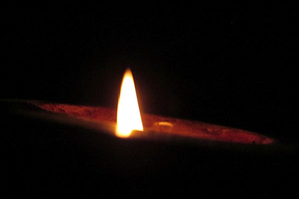 a candle flame one night with the electricity off