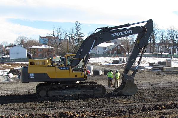 one backhoe at work in another part of Harrisonburg