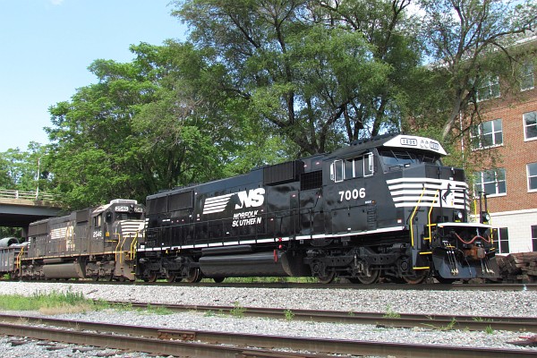 NS 2546 and 7006 waiting to pull a train of cars