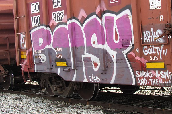 close-up of graffiti on the left-end of a boxcar
