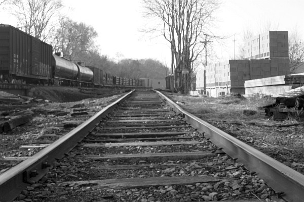 B&W version of NS train near R. S. Monger, Harrisonburg, VA (II)